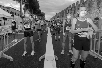 Start of the Pisa Half Marathon with athletes practicing social distancing during the pandemic in 2020