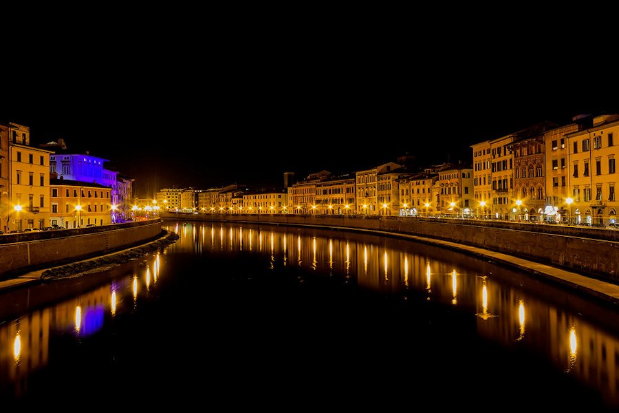 Night view of the 'Lungarni' of Pisa